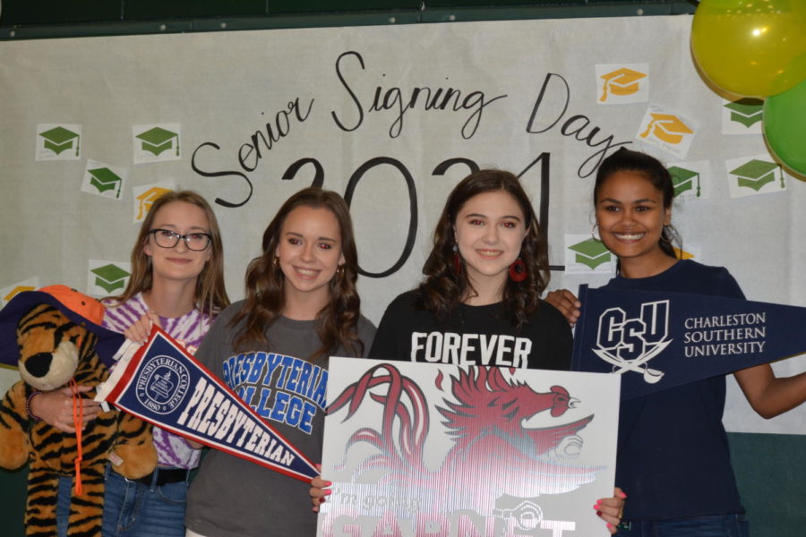 Seniors Shyanne Crowder, Ansley Crisp, Haleigh Tomlin and Angelina Hawthorne celebrate the times they had together during senior signing day, and they are excited to go to different colleges they plan to attend in the fall. 