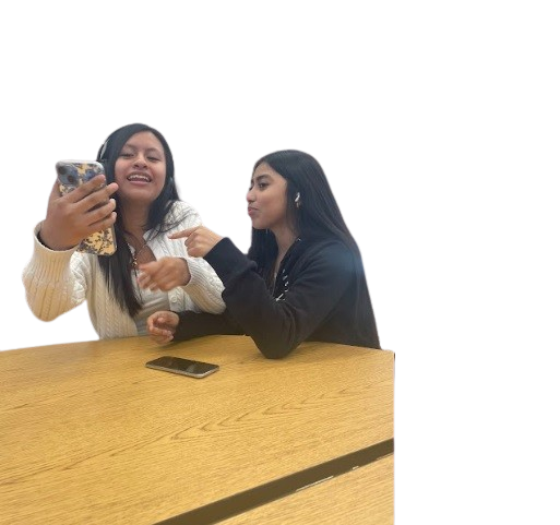 Freshmen Joselyn Juan Lucas and Brittany Cruz-Lopez bond over their shared love for Spanish music.